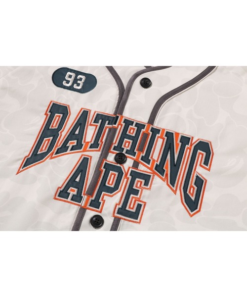 A BATHING APE（アベイシングエイプ）の「SOLID CAMO MULTI LOGO BASEBALL SS SHIRT（シャツ/ブラウス・メンズ・アイボリー/ネイビー・MEDIUM/X-LARGE/XX-LARGE/SMALL/LARGE）」の5枚目の写真