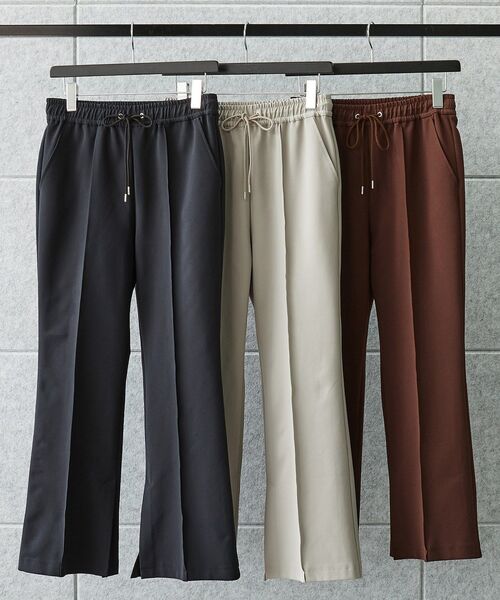 PICONE 黒のストレッチパンツ スリット入り裾 パール付き裾スリットストレッチロングパンツ