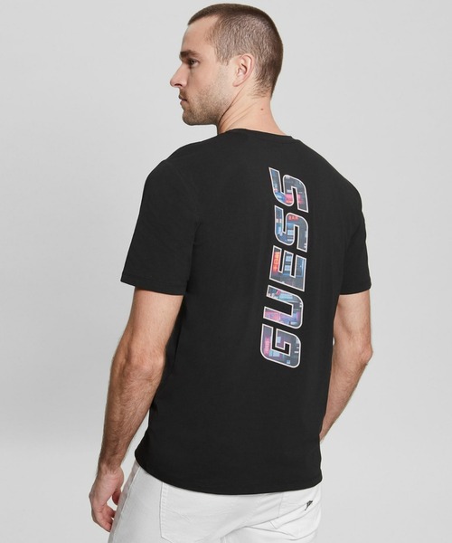 Guess(ゲス)の「Buster Logo Tee(Tシャツ/カットソー・メンズ・ホワイト/ブラック・SMALL/MEDIUM/LARGE/X-LARGE)」の1枚目の写真