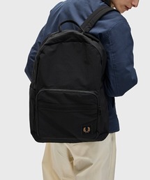 FRED PERRY（フレッドペリー）の「Nylon Badge Backpack（バックパック/リュック・メンズ）」