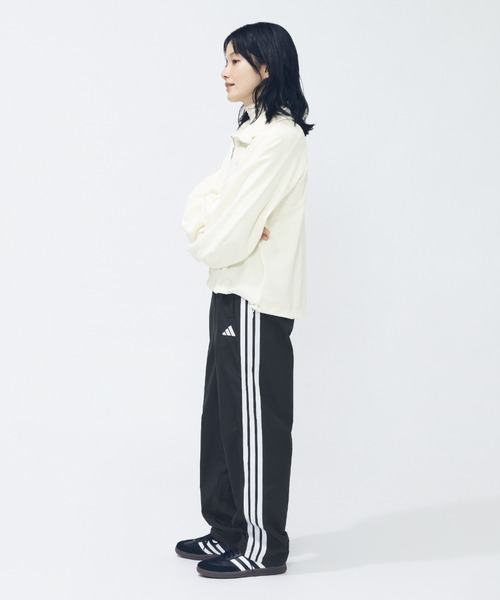 adidas（アディダス）の「アディダス adidas スリーストライプス ルーズフィット ウインドブレーカー パンツ（その他パンツ・レディース・ブラック/ネイビー/ブラック×ホワイト・S/M/L/XL）」の3枚目の写真