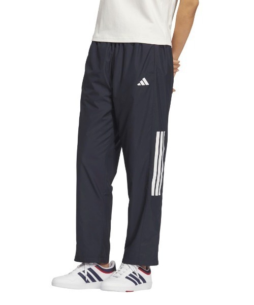 adidas(アディダス)の「アディダス adidas チーム ルーズフィット ウインドブレーカー パンツ(その他パンツ・レディース・ブラック/ネイビー/グレー・S/M/L/XL)」の1枚目の写真