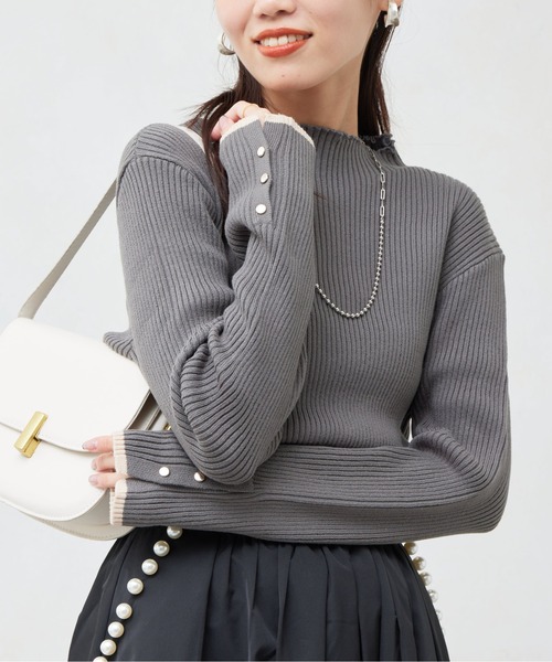 Chez toi（シェトワ）の「配色ライン袖口ボタンメローニットプル