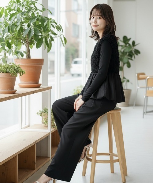 Lateru(ラテル)の「フェザーフリンジペプラムベスト|ふんわりフェミニンなレイヤーアイテム(ベスト・レディース・ホワイト/ブラック・FREE)」の5枚目の写真