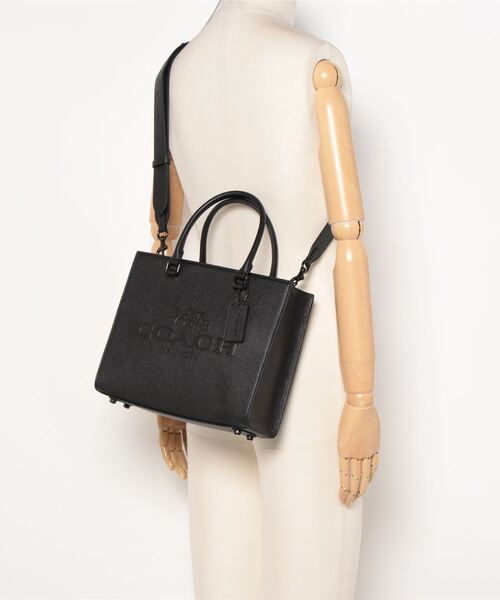 COACH（コーチ）の「トート・シグネチャー キャンバス インテリア 