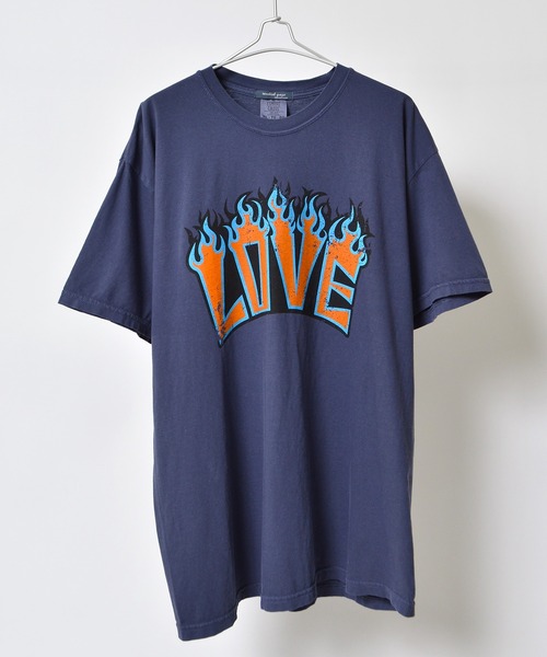 Revo.(レボ)の「MODISH GAZE LOVEロゴプリント ピグメント加工 ビッグシルエットTシャツ(Tシャツ/カットソー・メンズ・アイボリー/ネイビー/スミクロ・FREE)」の1枚目の写真