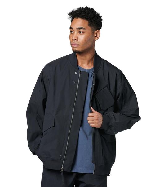UNDER ARMOUR(アンダーアーマー)の「UAシティ ボンバー ジャケット(ライフスタイル/メンズ/レディース)(その他アウター・レディース・ブラック・L/M/S/2XL)」の1枚目の写真
