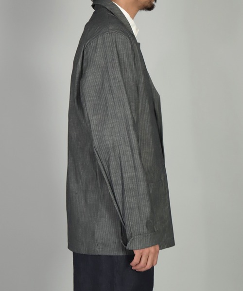 Yarmo（ヤーモ）の「[ Yarmo×OMNIGOD ] 別注 インディゴヘリンボーン ドライバースジャケット（テーラードジャケット・メンズ・グレー系その他・L/M）」の9枚目の写真