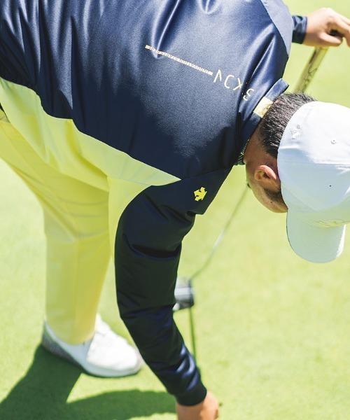 【美品】スリクソン Vネックプルオーバー ウィンドブレーカー L SRIXON（スリクソン）の「タイポデザインウインドプルオーバー V