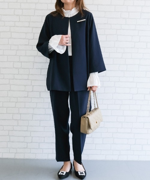 aquagarage(アクアガレージ)の「フリルスタンドカラーブラウス(シャツ/ブラウス・レディース・ブラック/ホワイト/ネイビー・L/M)」の10枚目の写真