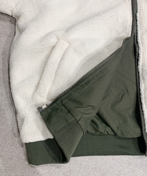 Mejoul（メジュール）の「フード付きリバーシブルボリュームブルゾンファーブルゾン（ブルゾン・レディース・ブルー/アイボリー/ブラック/カーキ・M/L）」の20枚目の写真