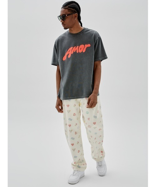 GUESS ORIGINALS（ゲスオリジナルズ）の「GUESS x J BALVIN/ゲス×ジェイバルヴィン/GO J BALVIN AMOR TEE（Tシャツ/カットソー・メンズ・ブラック・XL/L）」の5枚目の写真