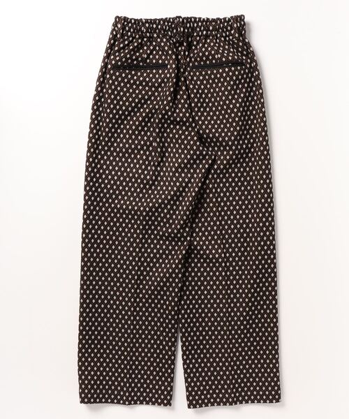 TAUPE(トープ)の「Diamond Pattern Track Pants(その他パンツ・メンズ・オレンジ/ブラック・2/3)」の3枚目の写真