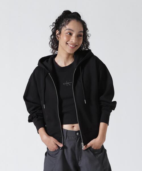 Calvin Klein(カルバン・クライン)の「Calvin Klein Jeans(カルバンクラインジーンズ)LS MONOGRAM TERRY CROPPED PARKA/モノグラムテリークロップドパーカー(パーカー・レディース・ホワイト/ブラック・S)」の2枚目の写真