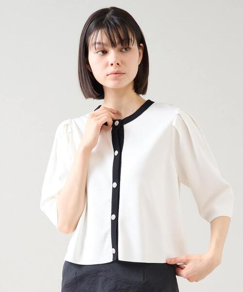 Tiara(ティアラ)の「ビジューボタンカーディガン(カーディガン/ボレロ・レディース・ホワイト×ブラック/ブルー/ブラック・FREE)」の1枚目の写真