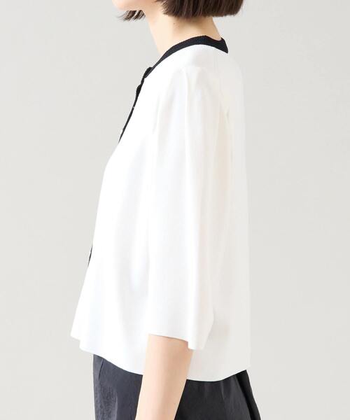 Tiara(ティアラ)の「ビジューボタンカーディガン(カーディガン/ボレロ・レディース・ホワイト×ブラック/ブルー/ブラック・FREE)」の9枚目の写真