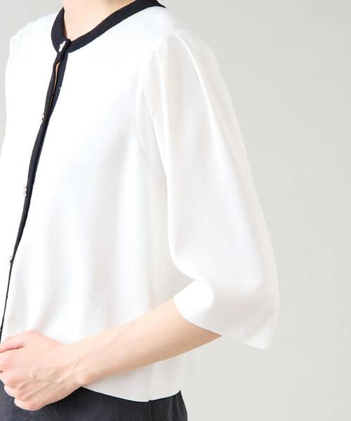 Tiara(ティアラ)の「ビジューボタンカーディガン(カーディガン/ボレロ・レディース・ホワイト×ブラック/ブルー/ブラック・FREE)」の11枚目の写真