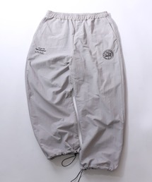 Mark Gonzales（マーク・ゴンザレス）の「MARK GONZALES ARTWORK COLLECTION/マークゴンザレス 別注 ワンポイント刺繍 ブロークコア ナイロパンツ トラックパンツ イージーパンツ（その他パンツ）」
