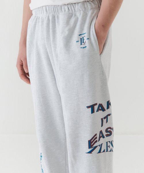 TRIP LE SENS(トリップ ル センス)の「ユニセックス TLES ロゴ ジョガーパンツ_IVORY(スウェットパンツ・レディース・その他・LARGE/MEDIUM)」の1枚目の写真