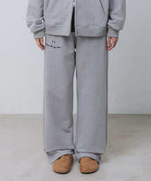 BAKKEN（バッケン）の「スマイル刺繍ロゴセミワイドスウェットパンツ BK9985_グレー（スウェットパンツ）」