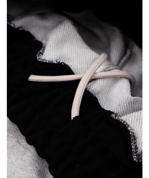 FABULOUS ARCHIVE（ファビュラスアーカイブ）の「NINE CURVED SWEAT PANTS MELANGRAY(FCG1PT734W)（スウェットパンツ・レディース・ライトグレー・SMALL）」の10枚目の写真