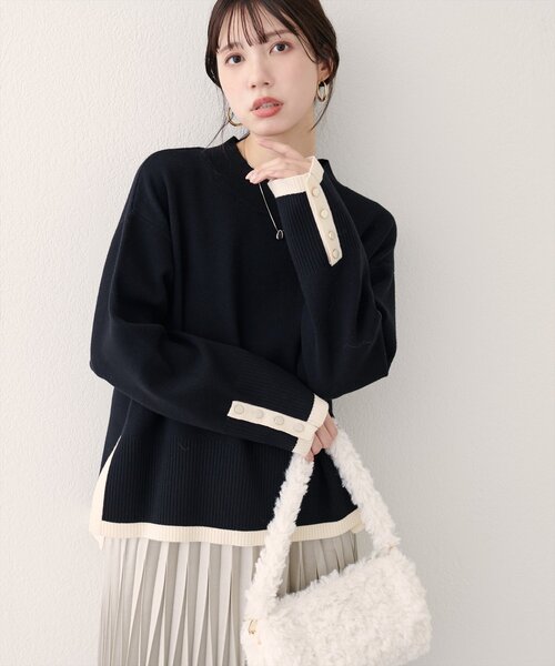 natural couture（ナチュラルクチュール）の「スタンドネック袖口釦ゆるニット（ニット/セーター・レディース・ホワイト系その他/ピンク/イエロー/ブラック/サックスブルー/アイボリー/オレンジ/ミント/ネイビー/ピンク系その他・FREE）」の4枚目の写真