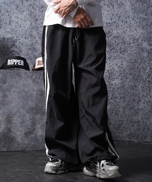 1111clothing（ワンフォークロージング）の「サイドライン バギートラックパンツ / Side Line Baggy Track Pants（その他パンツ・メンズ・グレー/ブラック・FREE）」の12枚目の写真