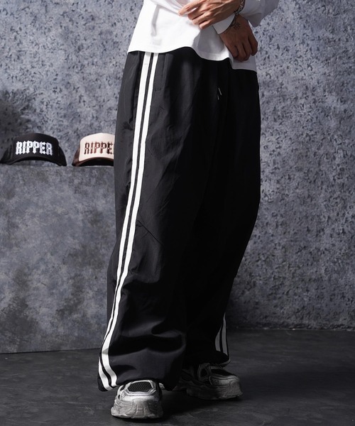 1111clothing（ワンフォークロージング）の「サイドライン バギートラックパンツ / Side Line Baggy Track Pants（その他パンツ・メンズ・グレー/ブラック・FREE）」の15枚目の写真