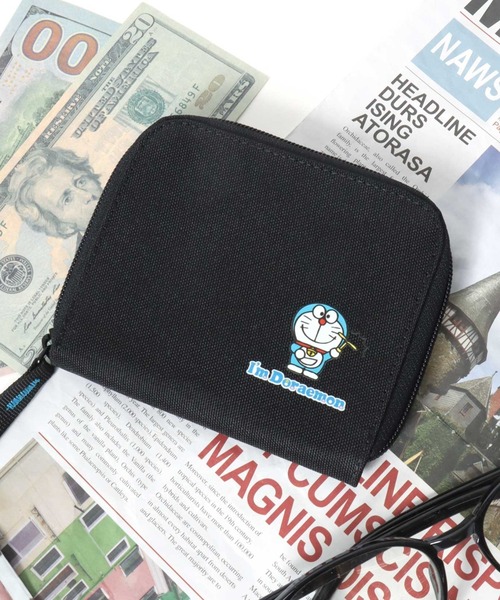 sanrio(サンリオ)の「I'm Doraemon(アイムドラえもん)キャラクタープリント 二つ折り財布/ラウンドファスナーウォレット(財布・レディース・ブラック・FREE)」の1枚目の写真