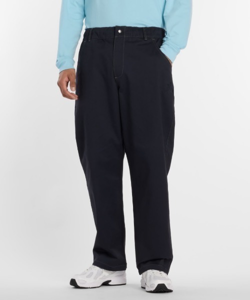 NEW BALANCE(ニューバランス)の「New Balance 大谷翔平 Signature Woven Twill Pants(ニューバランス 大谷翔平シグネチャーウーブンツイルパンツ)(チノパンツ・メンズ・ベージュ系/ネイビー・MEDIUM/LARGE/X-LARGE)」の1枚目の写真