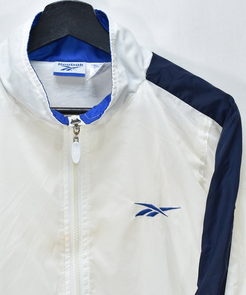 Reebok(リーボック)の「【ヴィンテージ古着】90's Reebok / リーボック フルジップ ナイロンジャケット(ナイロンジャケット・レディース・ホワイト・LARGE)」の1枚目の写真