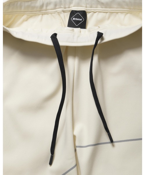 F.C.Real Bristol（エフシーレアルブリストル）の「PDK REFLECT LINE BAGGY PANTS（その他パンツ・メンズ・オフホワイト/ブラック・LARGE/MEDIUM/SMALL/X-LARGE）」の12枚目の写真