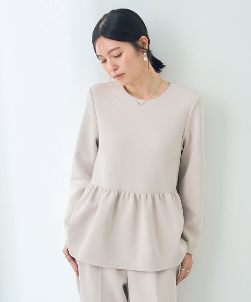 YECCA VECCA（イェッカヴェッカ）の「ペプラムブラウス（シャツ/ブラウス・レディース・ネイビー/ベージュ・FREE）」の2枚目の写真