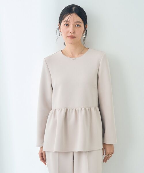 YECCA VECCA（イェッカヴェッカ）の「ペプラムブラウス（シャツ/ブラウス・レディース・ネイビー/ベージュ・FREE）」の3枚目の写真