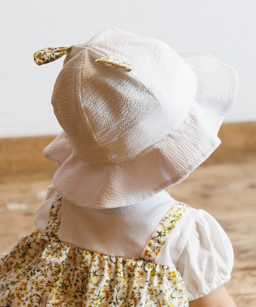 MAKE YOUR DAY（メイクユアデイ）の「小さなお花ベビーハット（ハット・キッズ・オフホワイト/ピンク・48/50/46）」の5枚目の写真