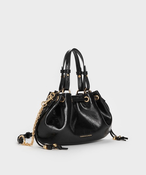 CHARLES & KEITH（チャールズ & キース）の「Moxieミニモキシードローストリングバケットバッグ（ショルダーバッグ・レディース・ブラック・S）」の5枚目の写真