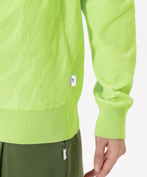 New Balance Golf(ニューバランスゴルフ)の「【new balance golf】ゼブラ柄 ニット プルオーバー フーディー (WOMENS)(パーカー・レディース・ブラック/ホワイト/イエロー・MEDIUM/LARGE/SMALL)」の13枚目の写真