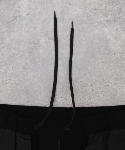 ATON(エイトン)の「【ATON / エイトン】STRETCH WOOLY NYLON PARACHUTE CARGO(カーゴパンツ・メンズ・ブラック・4/6)」の14枚目の写真