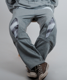 poq（ピーオーキュー）の「ベイルドスウェットパンツ - Miscommunication（スウェットパンツ）」