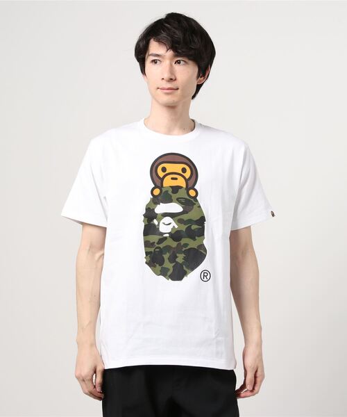 A BATHING APE(アベイシングエイプ)の「1ST CAMO MILO ON APE HEAD TEE M(Tシャツ/カットソー・メンズ・ブラック×グリーン/ブラック×イエロー/ホワイト×イエロー/ホワイト×グリーン・SMALL/MEDIUM/LARGE/X-LARGE/XX-LARGE/XXX-LARGE)」の2枚目の写真
