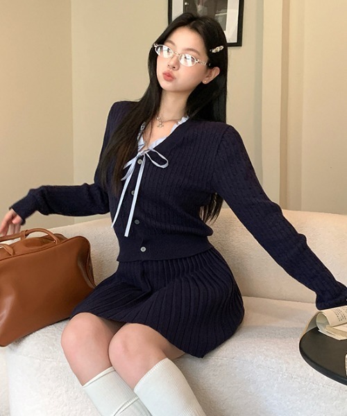 Mejoul(メジュール)の「【セットアップ】レースリボンケーブルニットトップス×プリーツニットスカート(セットアップ・レディース・アイボリー/ネイビー・F)」の20枚目の写真