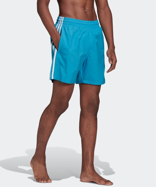 adidas(アディダス)の「アディカラー クラシックス トレース ショーツ / アディダスオリジナルス(水着・メンズ・スカイブルー・SMALL/MEDIUM/LARGE/X-LARGE/XX-LARGE/XXX-LARGE/X-SMALL)」の2枚目の写真