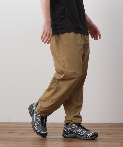 MANASTASH(マナスタッシュ)の「MANASTASH×MASTERPIECE SOUND/マナスタッシュ×マスターピースサウンド/TRACK PANTS/トラックパンツ(その他パンツ・メンズ・ブラック/タン・L/XL/S/M)」の5枚目の写真