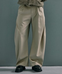 CONZ（コンズ）の「CURVE LEG TROUSERS GABA（スラックス）」