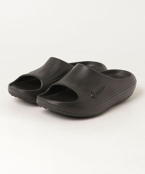 NIKE(ナイキ)の「NIKE REACTX REJUVEN8 SLIDE ナイキ REACTX リジュビネイト スライド(スリッポン・メンズ・ブラック・27cm/26cm/29cm/28cm)」の1枚目の写真