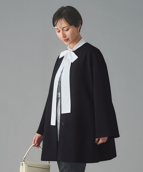 UNITED ARROWS(ユナイテッドアローズ)の「SPONGY Aライン ミドルコート(ノーカラーコート・レディース・ブラック/ネイビー・38/36)」の3枚目の写真