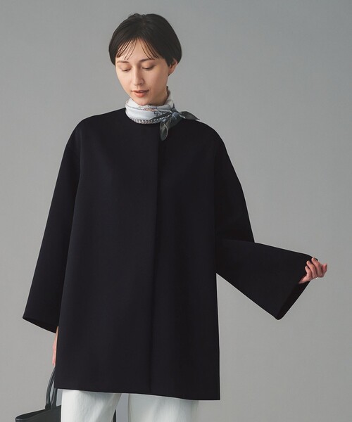 UNITED ARROWS(ユナイテッドアローズ)の「SPONGY Aライン ミドルコート(ノーカラーコート・レディース・ブラック/ネイビー・38/36)」の6枚目の写真