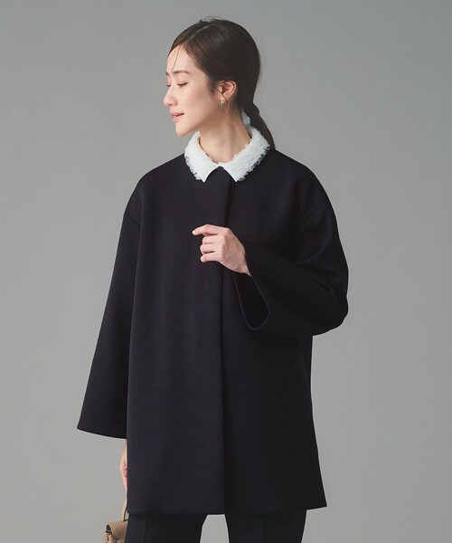 UNITED ARROWS(ユナイテッドアローズ)の「SPONGY Aライン ミドルコート(ノーカラーコート・レディース・ブラック/ネイビー・38/36)」の8枚目の写真