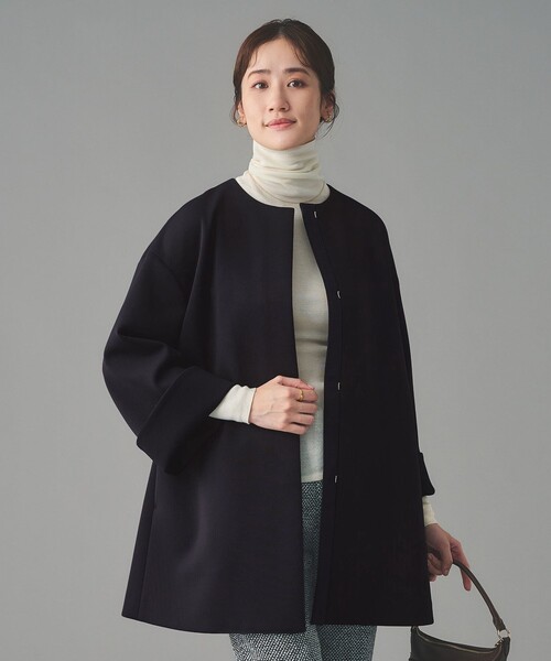 UNITED ARROWS(ユナイテッドアローズ)の「SPONGY Aライン ミドルコート(ノーカラーコート・レディース・ブラック/ネイビー・38/36)」の11枚目の写真