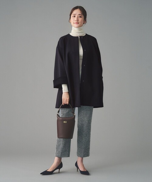 UNITED ARROWS(ユナイテッドアローズ)の「SPONGY Aライン ミドルコート(ノーカラーコート・レディース・ブラック/ネイビー・38/36)」の12枚目の写真